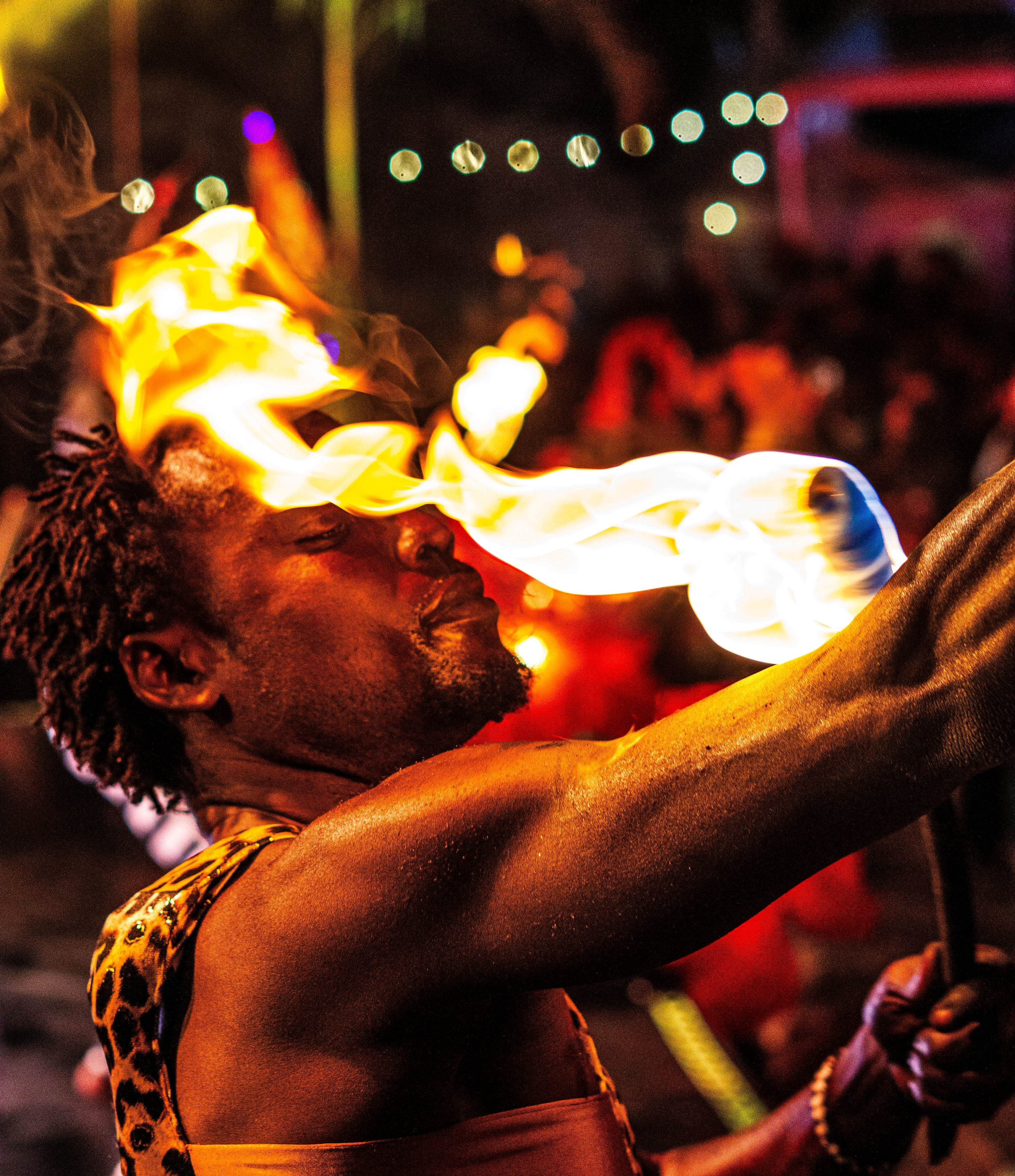 Close-up of a fire performer at ASILI Experience