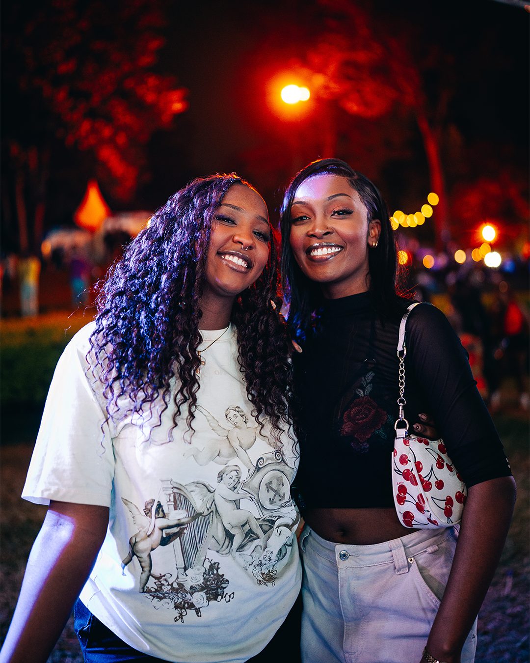 Friends smiling at ASILI Experience event day in Nairobi